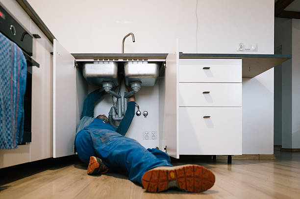 Professional Drain Cleaning technician working in Corona, CA